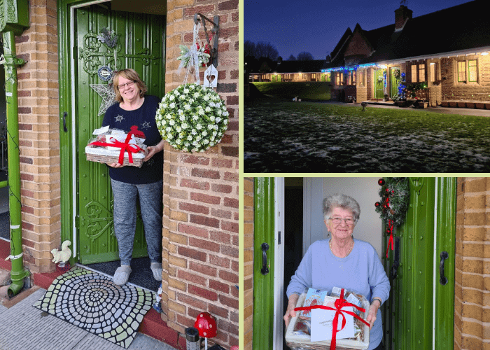 Residents with Christmas hampers